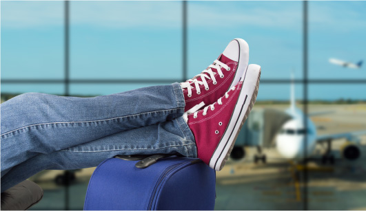 Traveller using a mobile phone